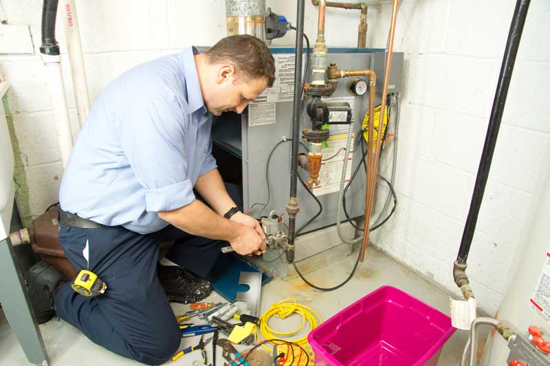 Man repairing Furnace